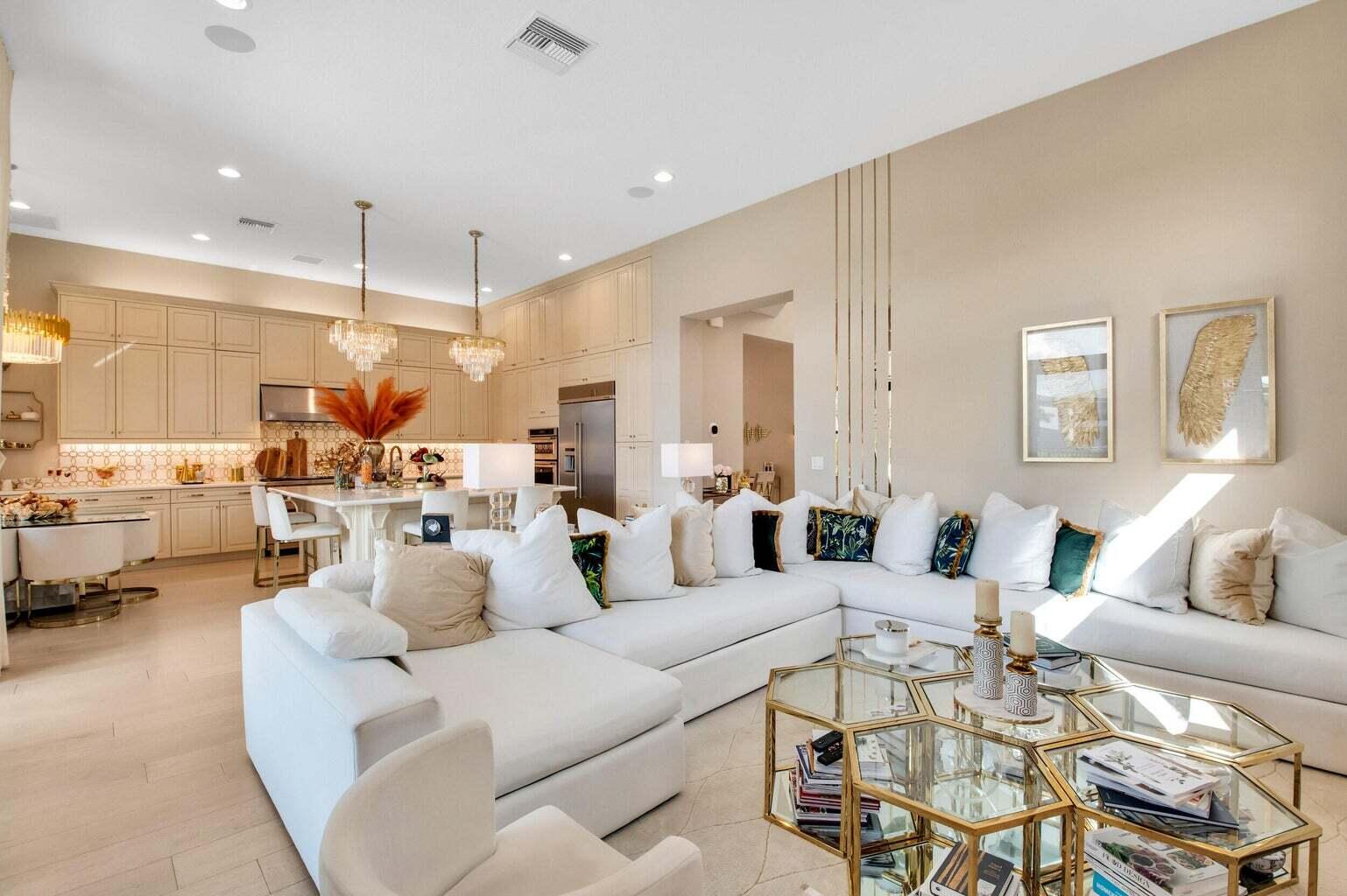 9016 Chauvet Way Boca Raton, FL 33496 - Photo 27 of 79 a living room with furniture and a large window
