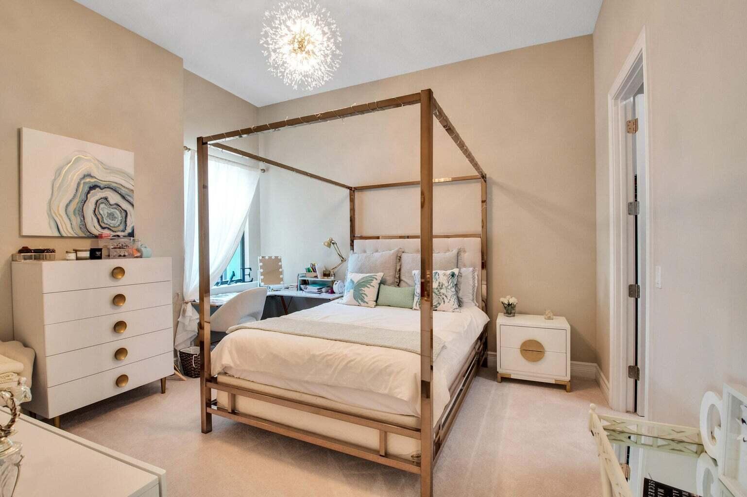 9016 Chauvet Way Boca Raton, FL 33496 - Photo 49 of 79 a bedroom with a bed and a window