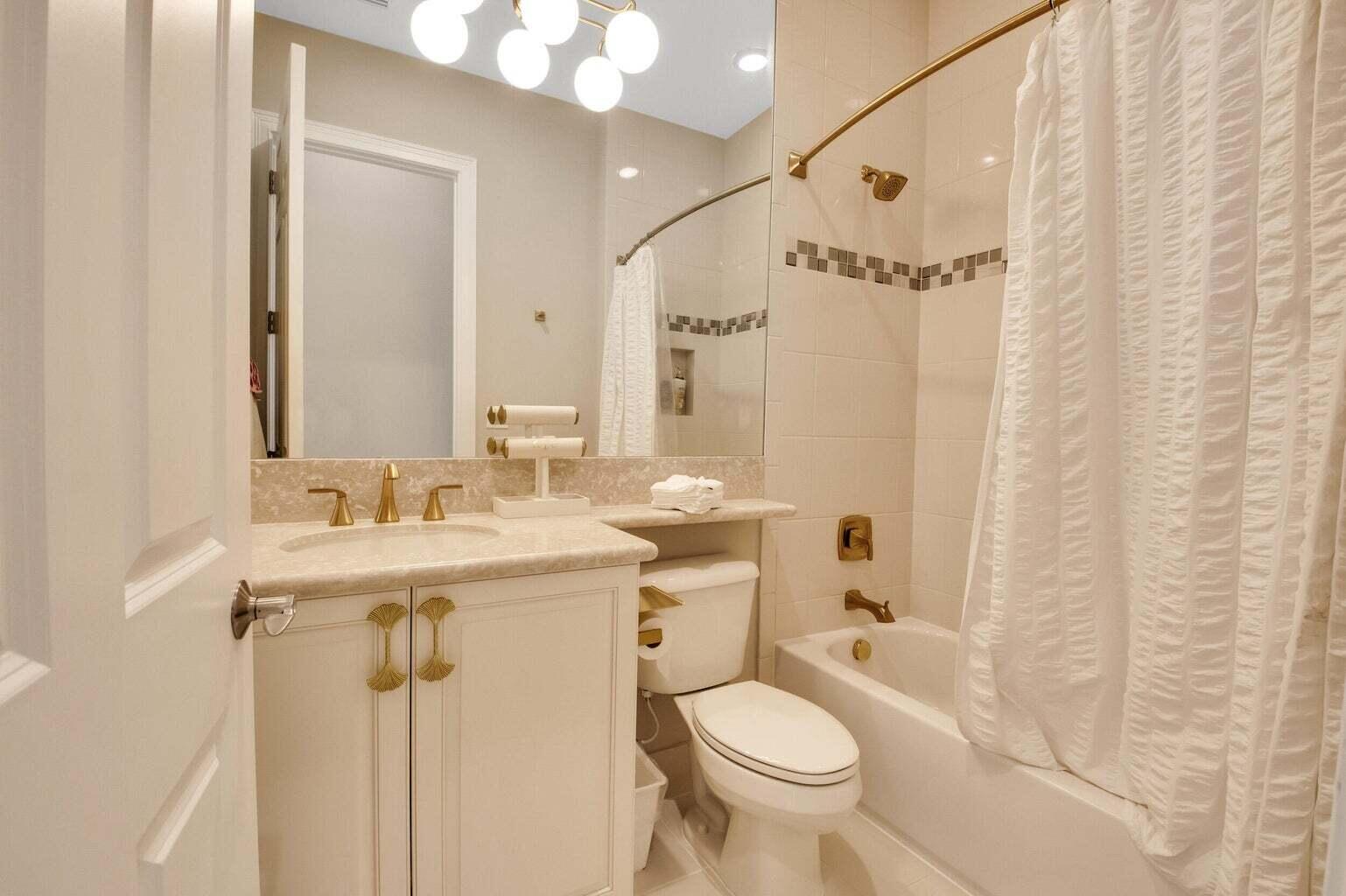 9016 Chauvet Way Boca Raton, FL 33496 - Photo 51 of 79 a bathroom with a sink toilet and shower