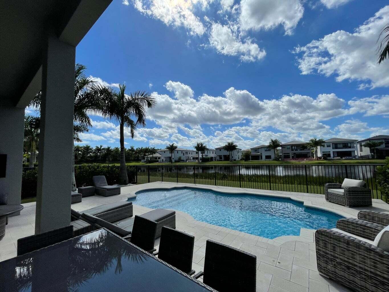 9016 Chauvet Way Boca Raton, FL 33496 - Photo 69 of 79 a view of swimming pool with seating space and barbeque oven