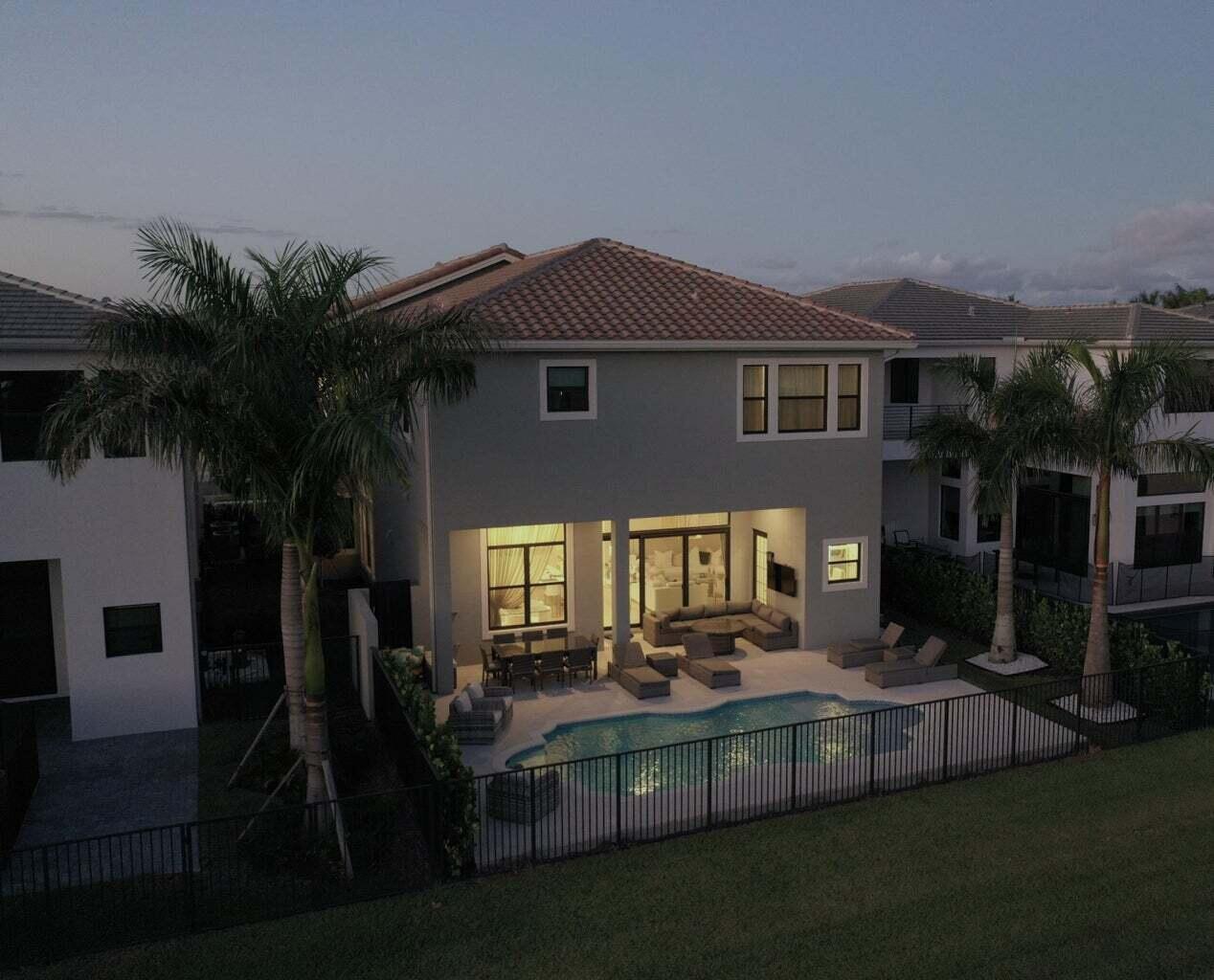 9016 Chauvet Way Boca Raton, FL 33496 - Photo 72 of 79 a front view of a house with a yard
