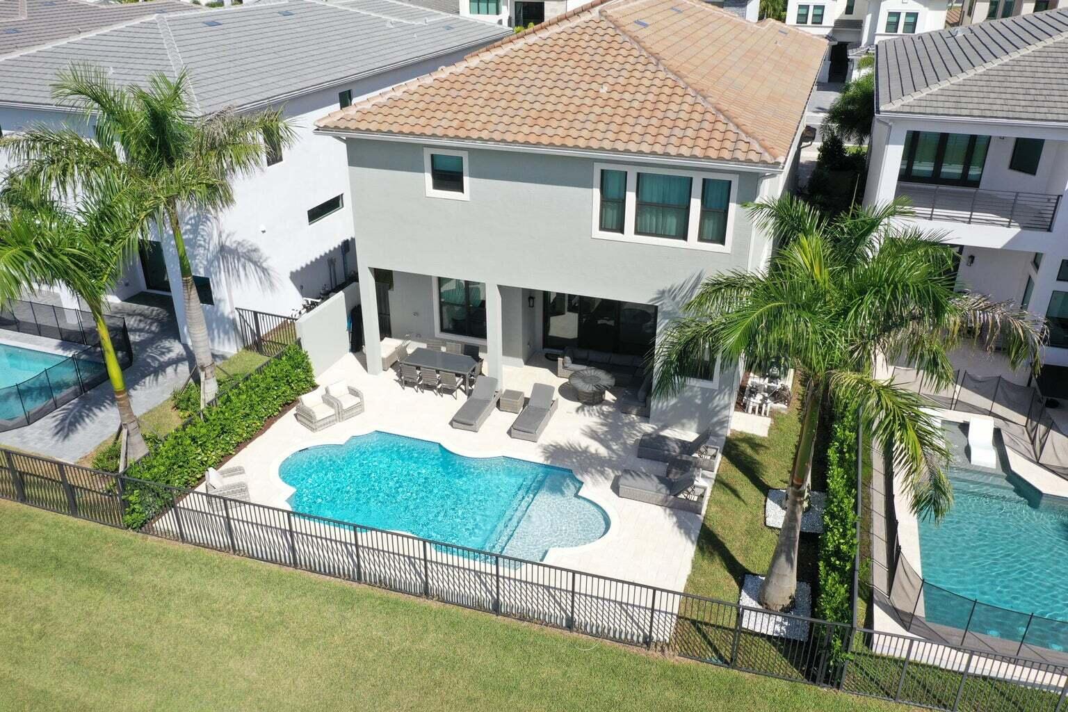 9016 Chauvet Way Boca Raton, FL 33496 - Photo 74 of 79 a view of a house with backyard and sitting area