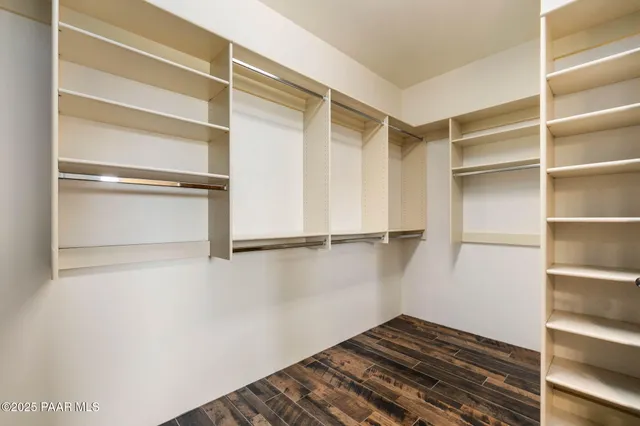a view of an empty walk in closet