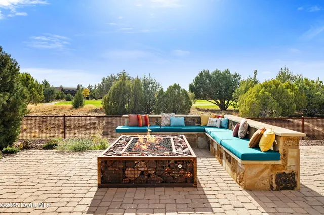 a view of a chairs and table on the terrace