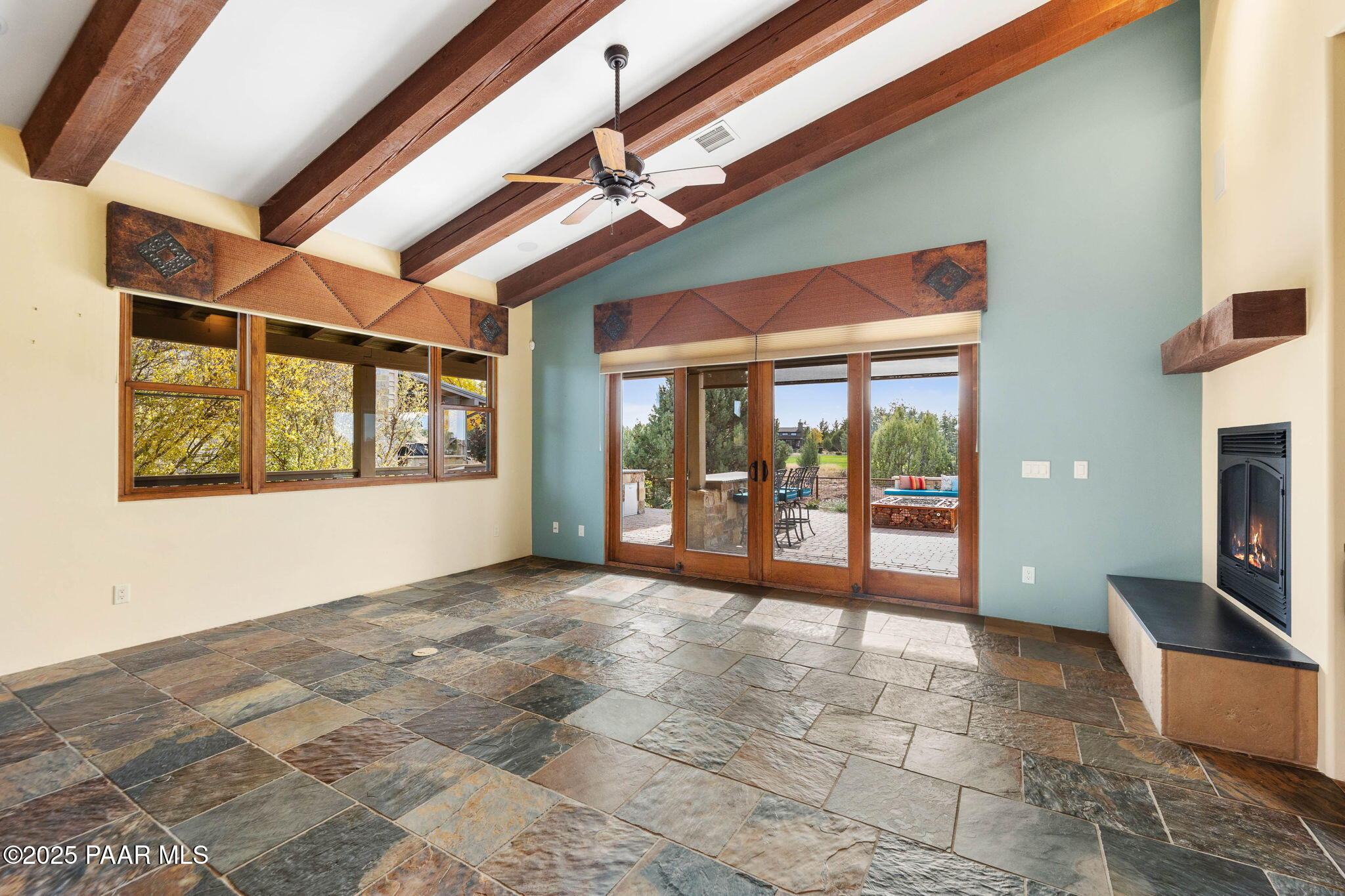 14850 Jay Morrish Drive Prescott, AZ 86305 - Photo 7 of 49 a view of empty room with floor to ceiling window and fireplace