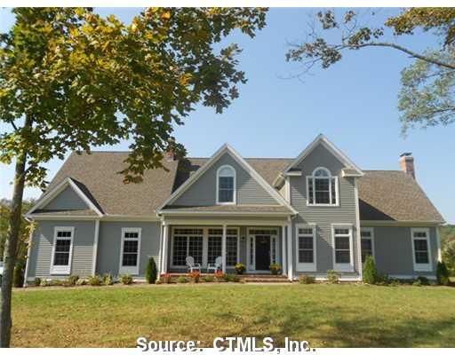 110 North Madison Road Guilford, CT 06437 - Photo 1 of 1 front view of a house with a yard