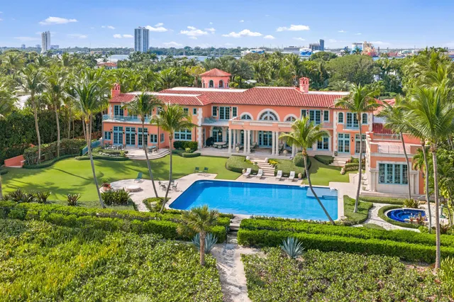 a view of a big yard with table and chairs and a yard