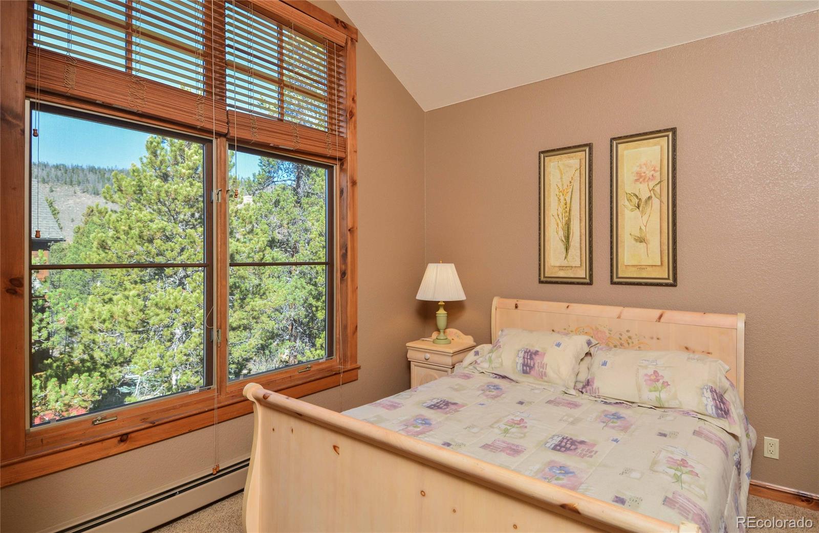 57 Lake Ridge Circle Keystone, CO 80435 - Photo 13 of 27 a bedroom with a bed and a window