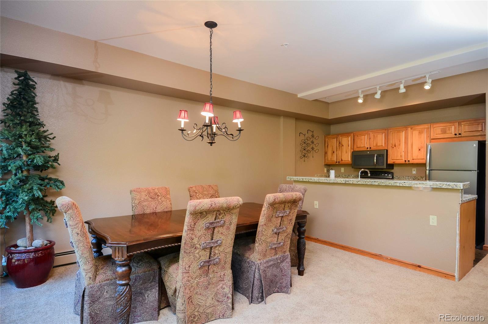 57 Lake Ridge Circle Keystone, CO 80435 - Photo 4 of 27 a view of a dining room with furniture window and wooden floor