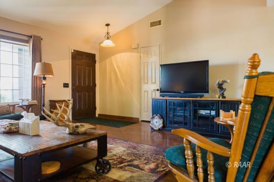 643 North Rio Bravo Street Ridgecrest, CA 93555 - Photo 5 of 29 a living room with furniture and a flat screen tv