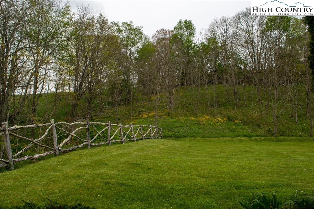 114 Red Deer Road, Unit D Banner Elk, NC 28604 - Photo 40 of 40 a view of a field with sitting space