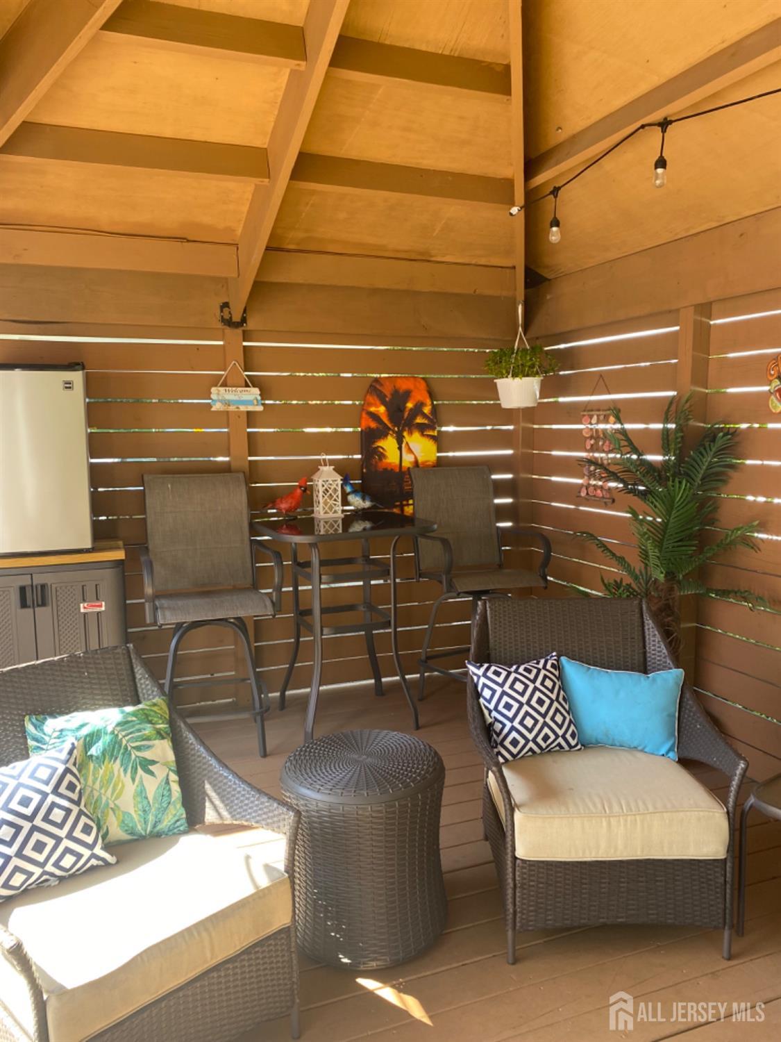 27 Brookside Road Edison, NJ 08817 - Photo 15 of 30 a view of a chairs with a outdoor space