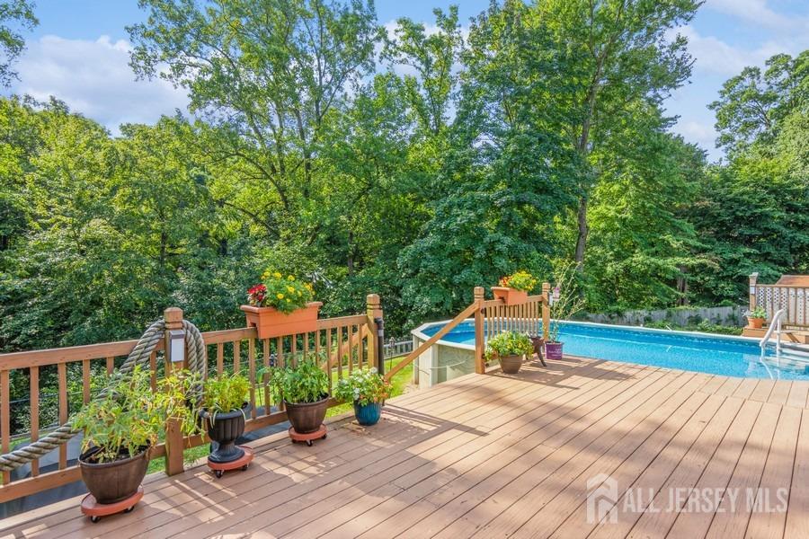 27 Brookside Road Edison, NJ 08817 - Photo 17 of 30 a view of a terrace with sitting area