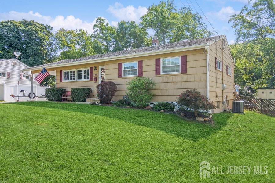 27 Brookside Road Edison, NJ 08817 - Photo 30 of 30 a front view of house with yard and green space