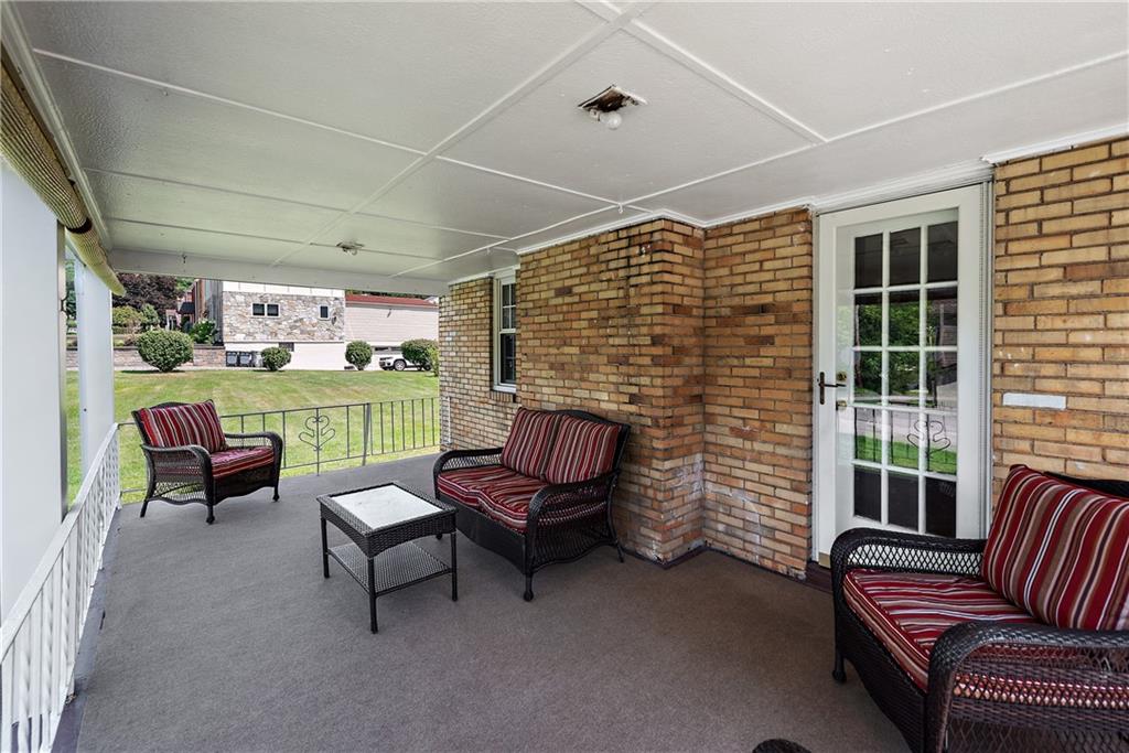 908 Greenhill Road Pittsburgh, PA 15209 - Photo 2 of 23 a outdoor living space with furniture and a yard