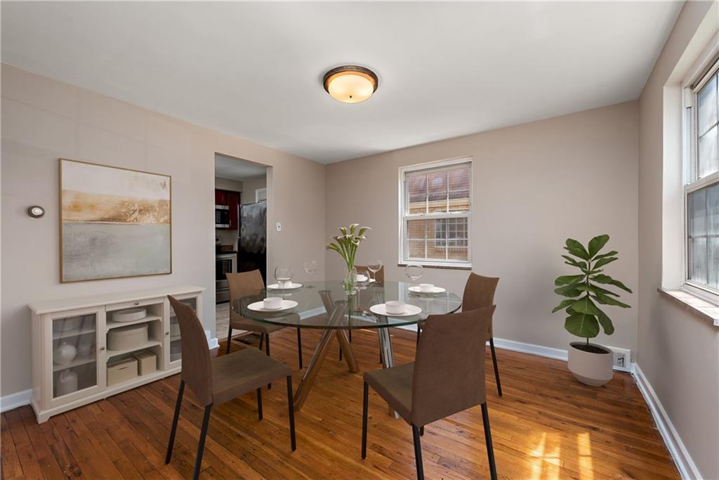 908 Greenhill Road Pittsburgh, PA 15209 - Photo 4 of 23 a view of a dining room with furniture and wooden floor
