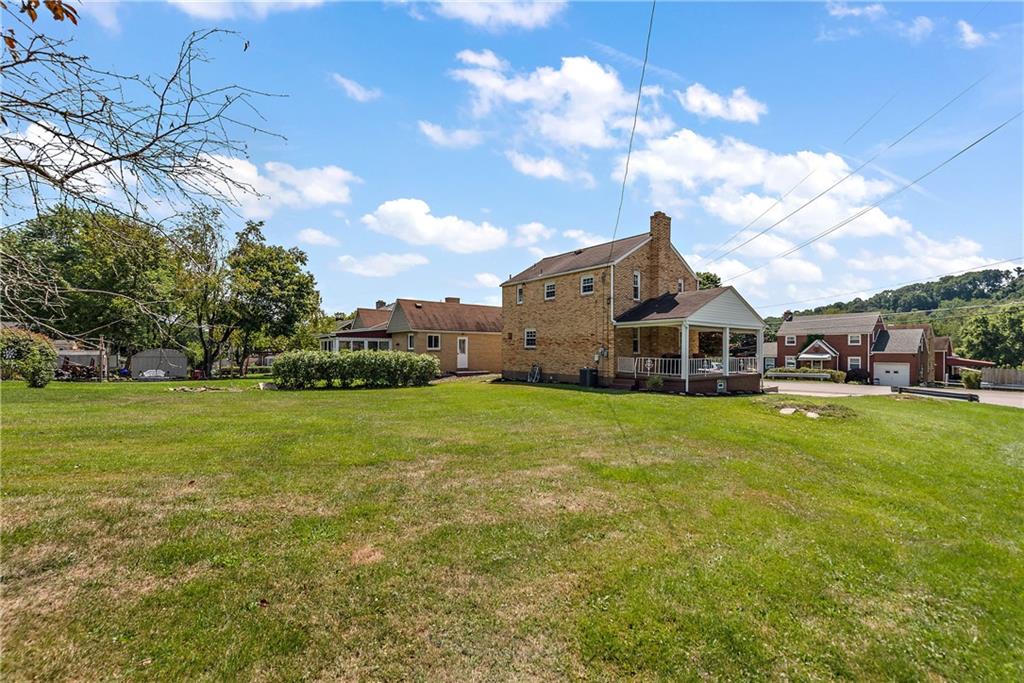 908 Greenhill Road Pittsburgh, PA 15209 - Photo 5 of 23 a front view of a house with garden
