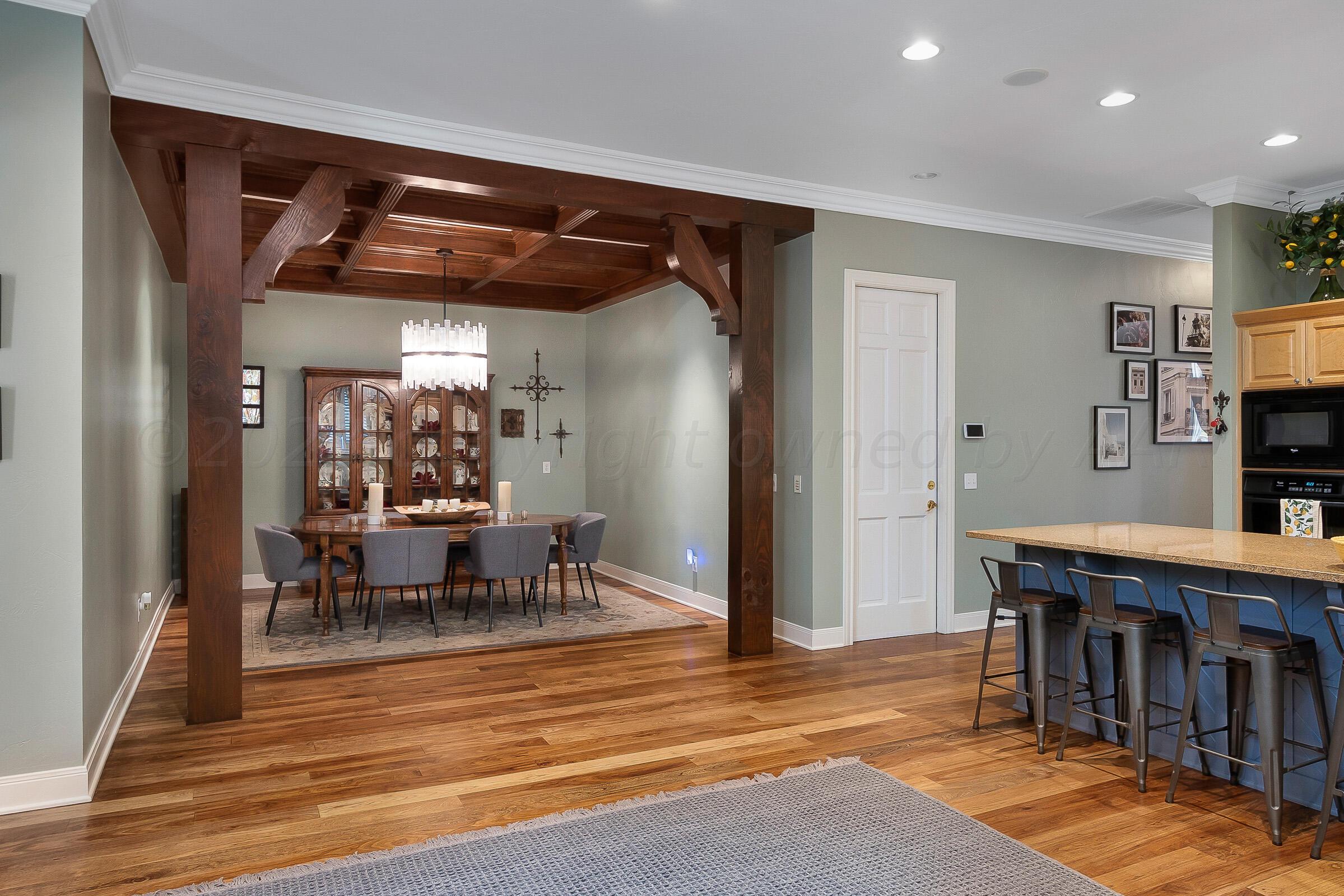 6202 Raintree Court Amarillo, TX 79119 - Photo 15 of 36 a view of a dining room with furniture and chandelier