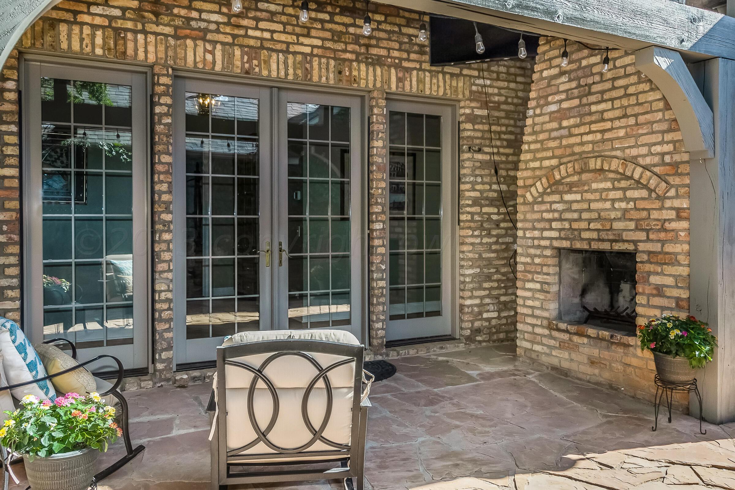 6202 Raintree Court Amarillo, TX 79119 - Photo 2 of 36 a front view of a house with a yard