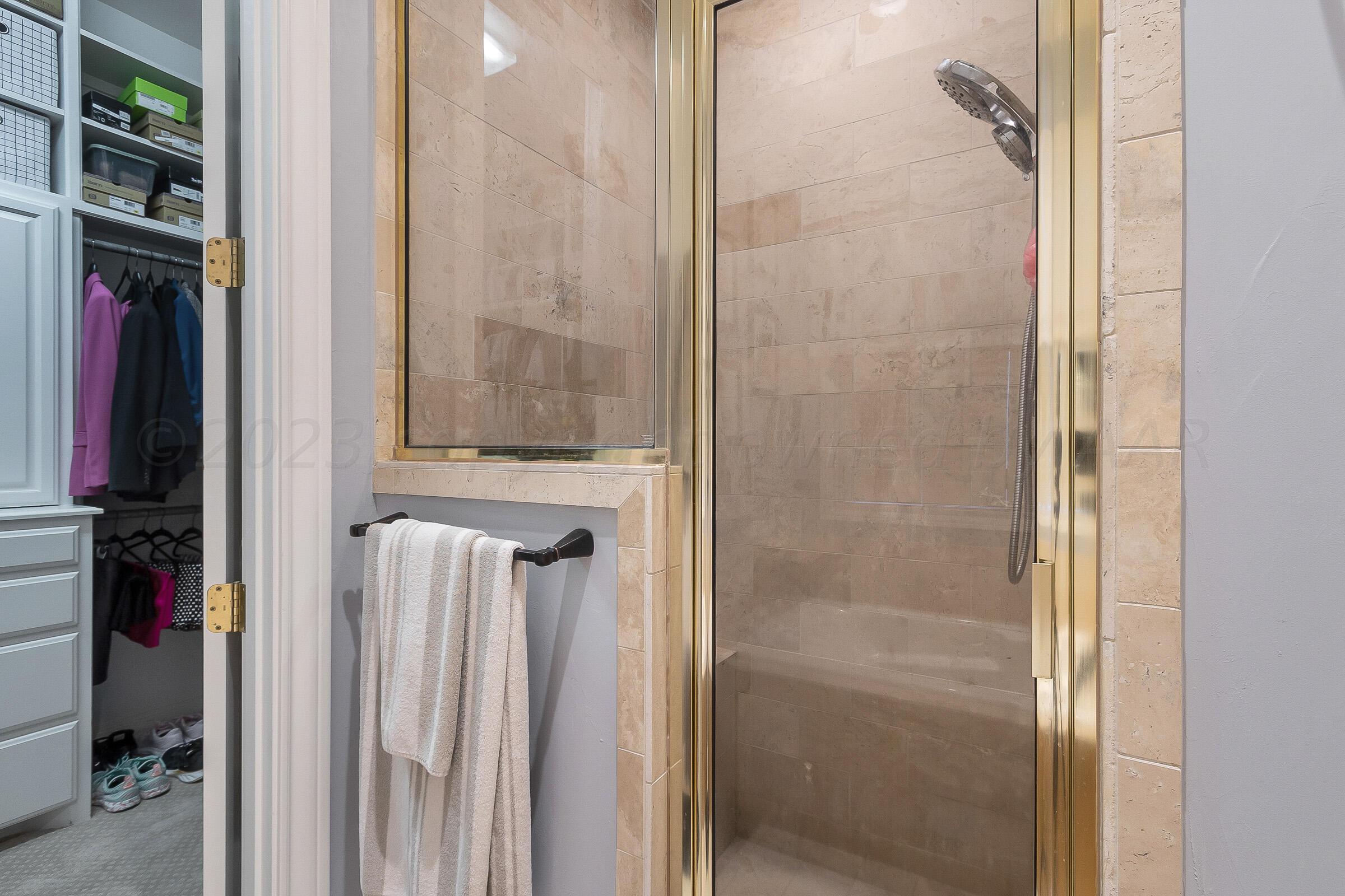 6202 Raintree Court Amarillo, TX 79119 - Photo 21 of 36 a bathroom with a shower