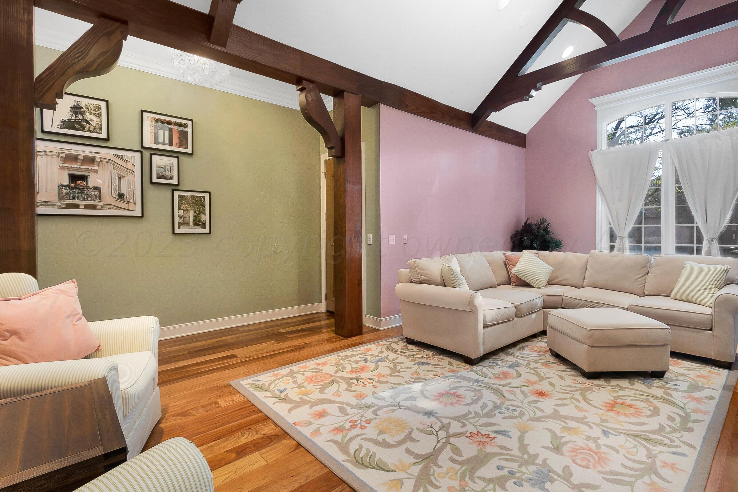 6202 Raintree Court Amarillo, TX 79119 - Photo 7 of 36 a living room with furniture and a rug