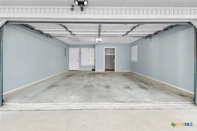 a view of a room with wooden walls