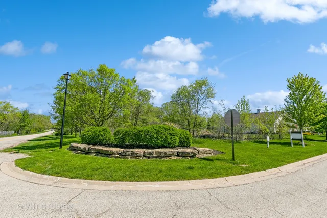 a view of a golf course with a fountain
