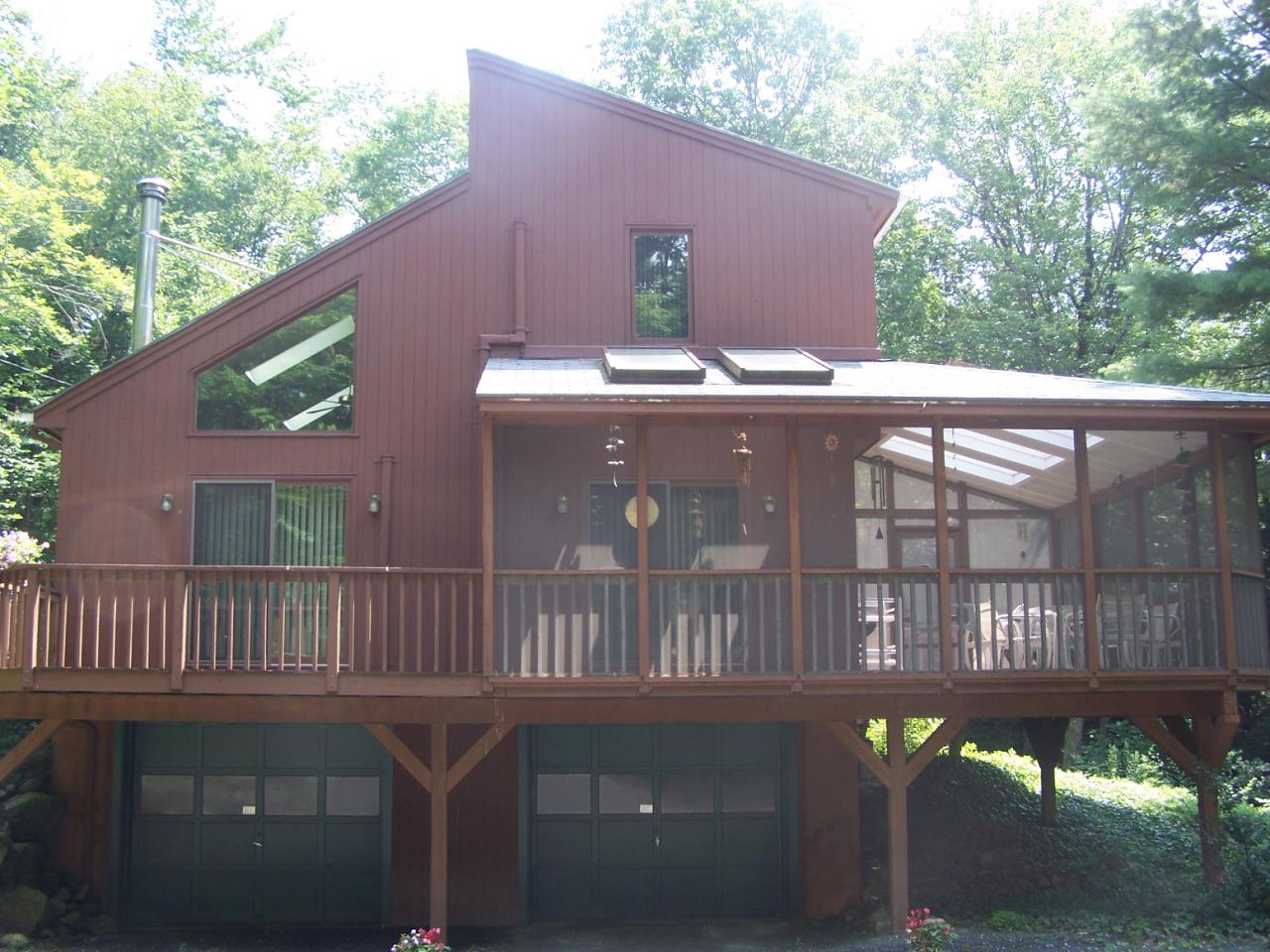 1575 West Center Road Otis, MA 01253 - Photo 1 of 1 a front view of a house with a yard