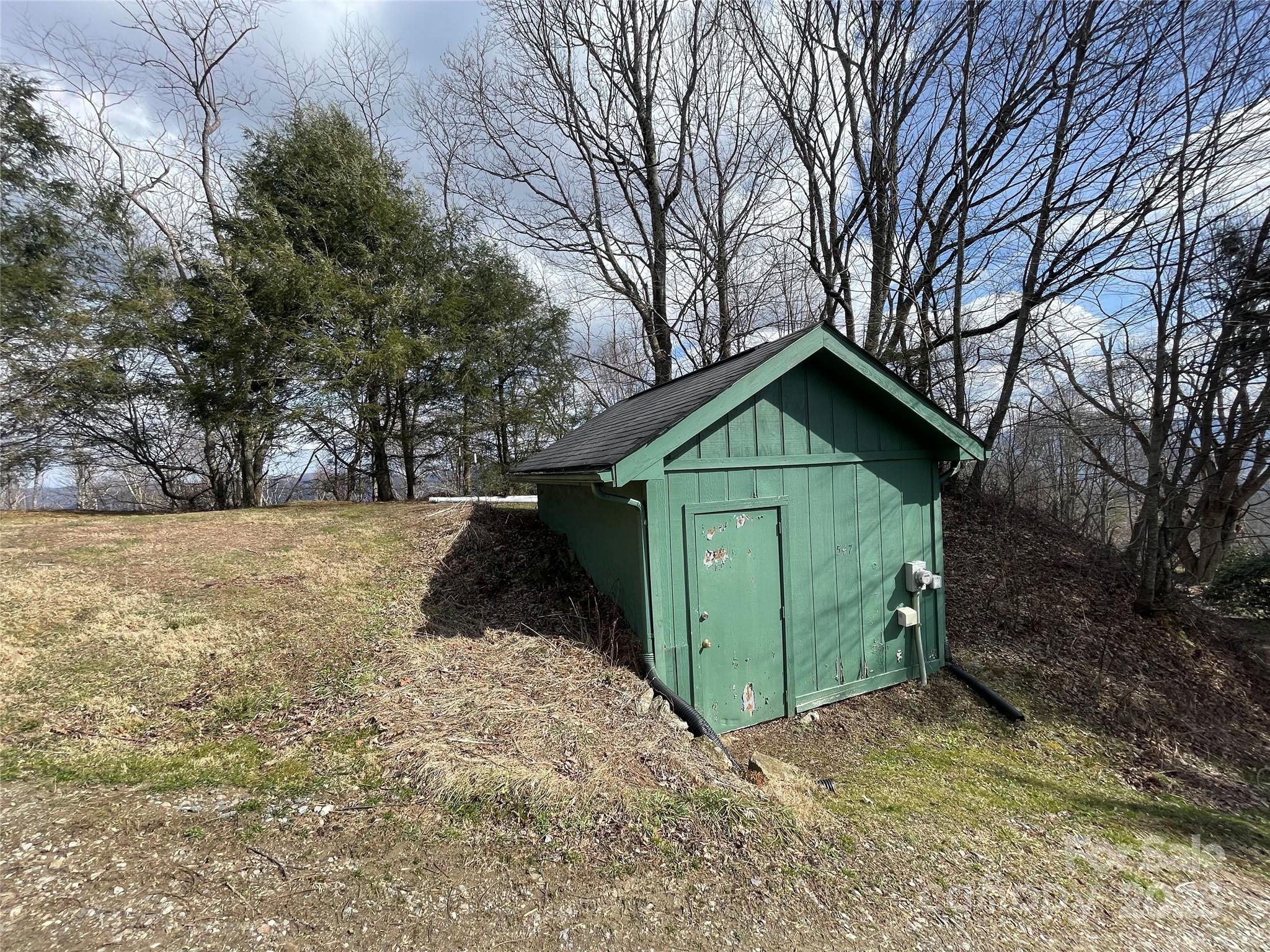 Lot #39 Ridge Top Circle Clyde, NC 28721 - Photo 34 of 35 a view of backyard with tree