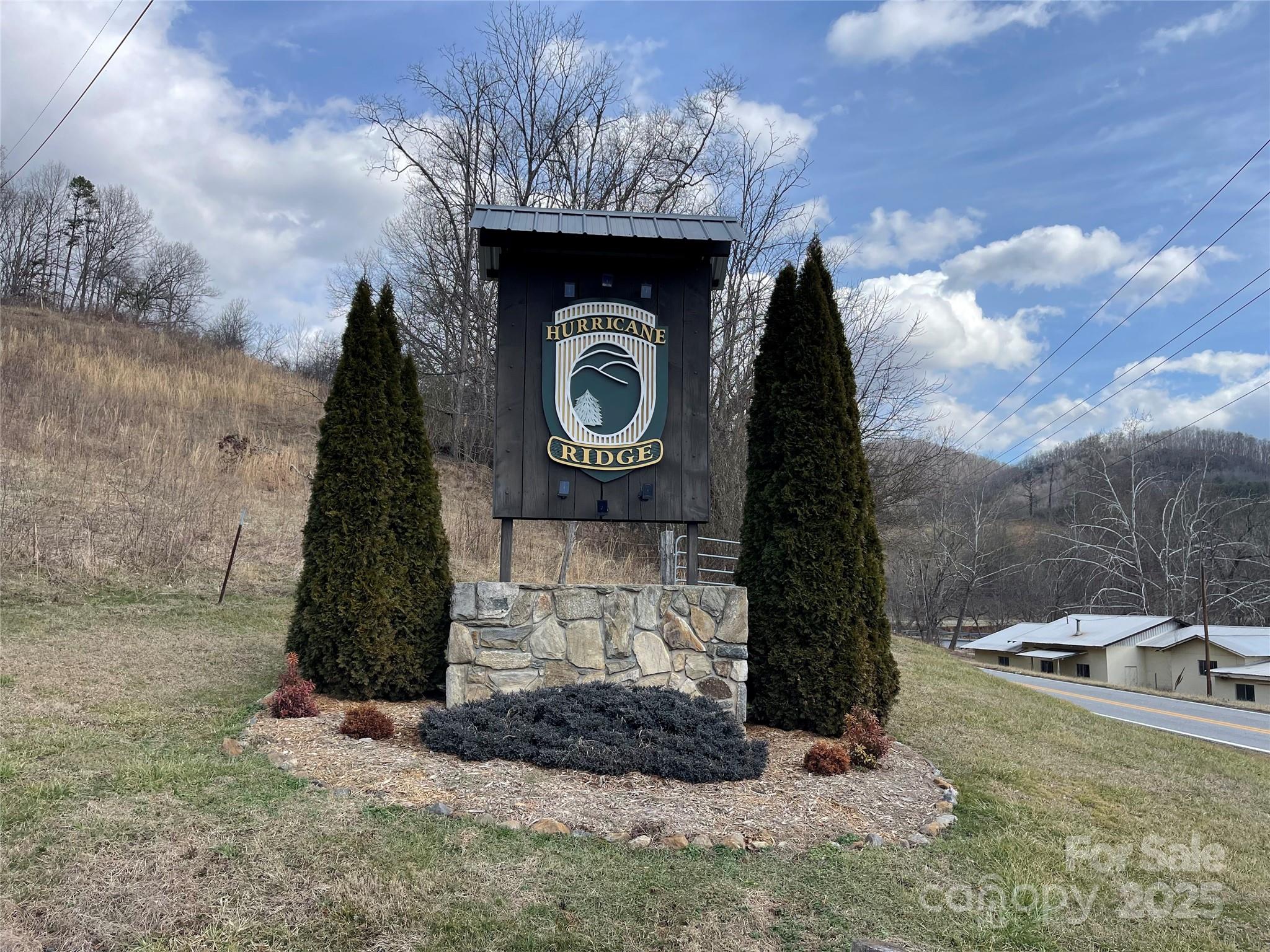 Lot #39 Ridge Top Circle Clyde, NC 28721 - Photo 35 of 35 a water heater is sitting in the middle of a yard