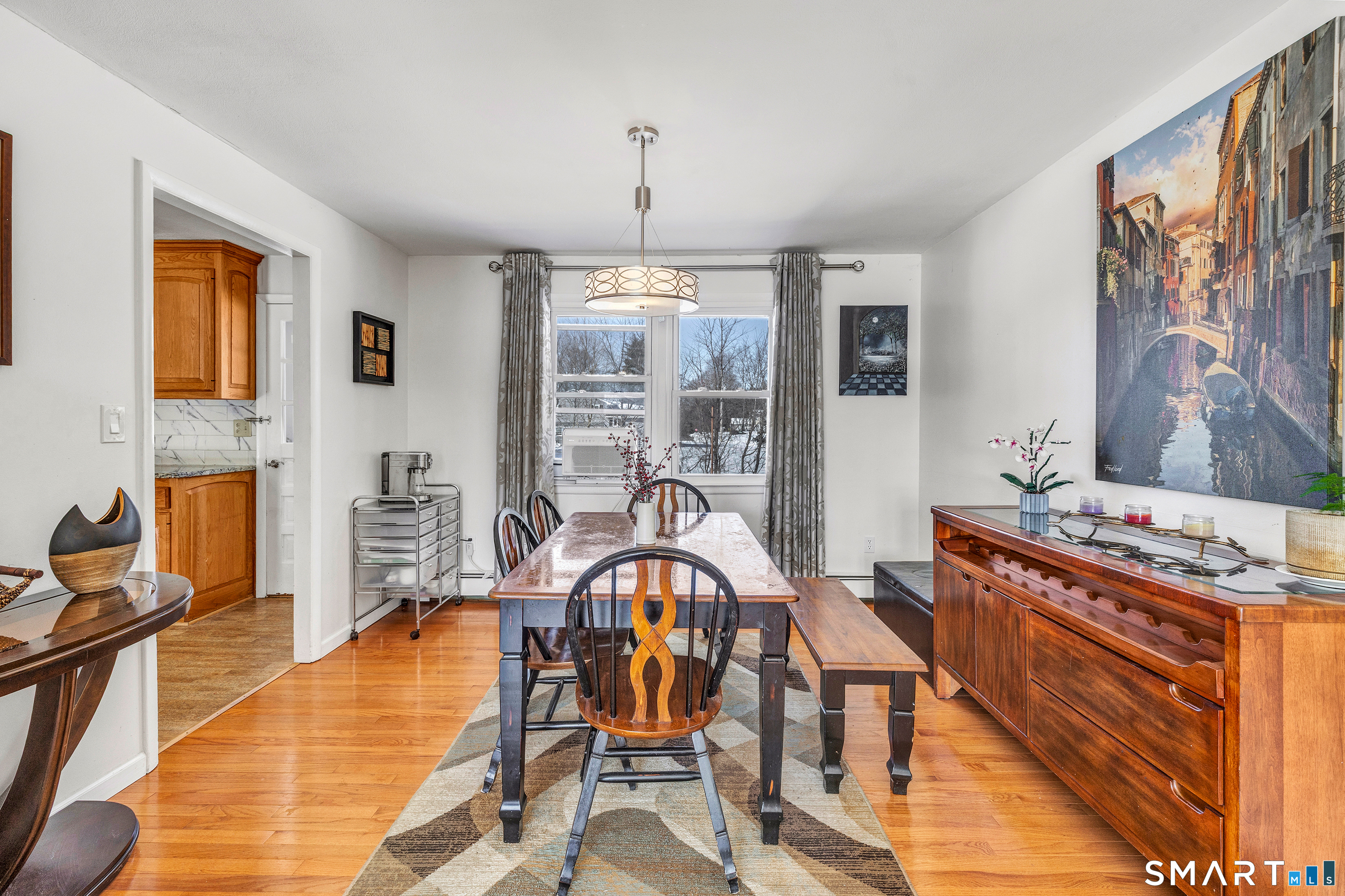 39 Zephyr Road Trumbull, CT 06611 - Photo 17 of 36 a dining room with furniture and window