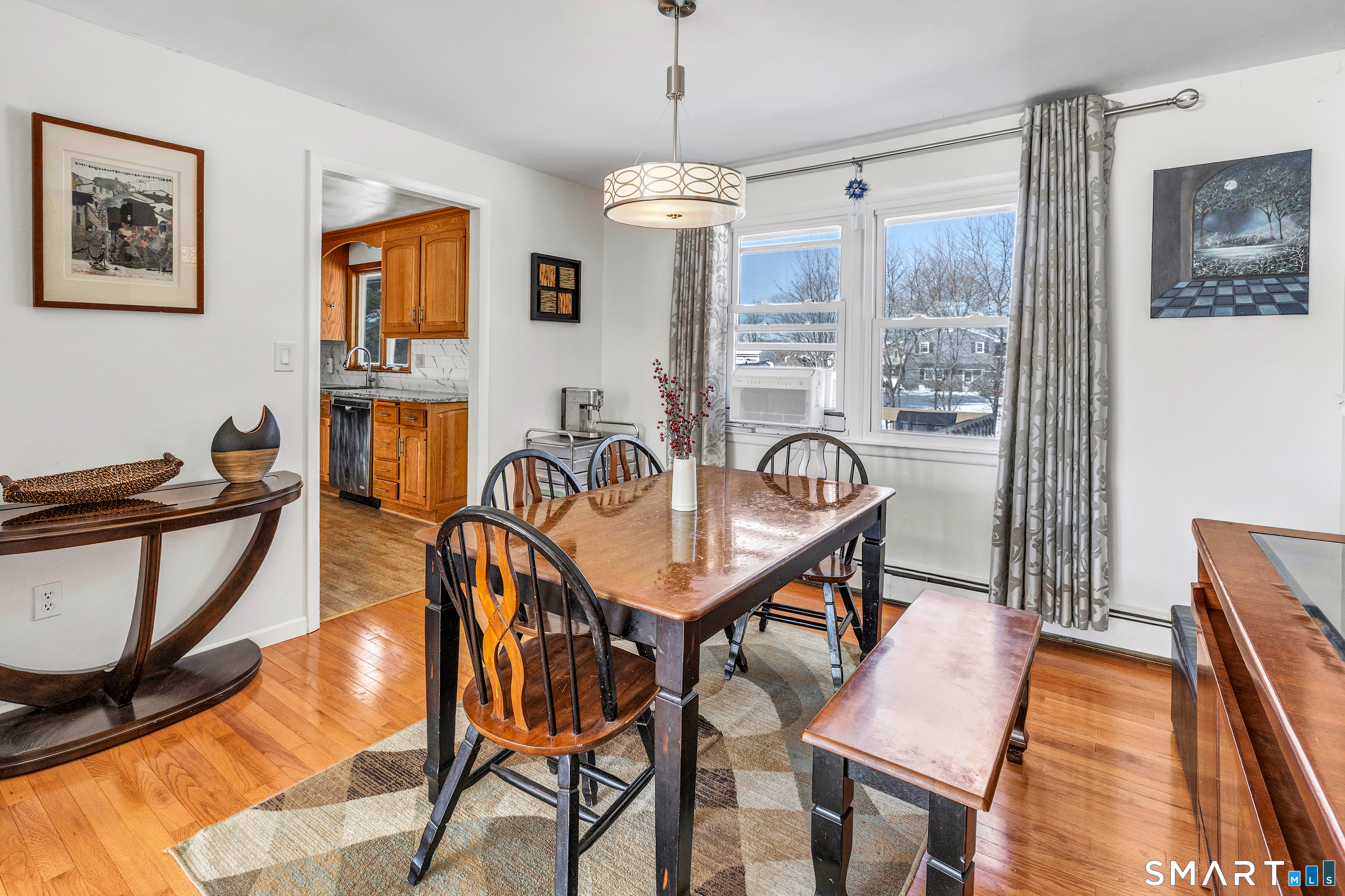 39 Zephyr Road Trumbull, CT 06611 - Photo 18 of 36 a dining room with furniture and window