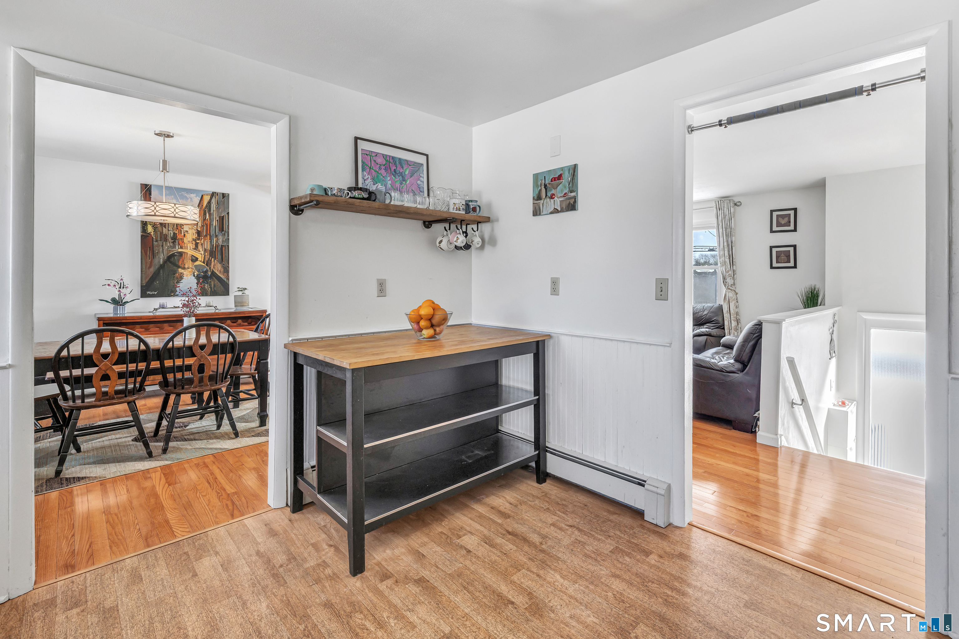 39 Zephyr Road Trumbull, CT 06611 - Photo 24 of 36 a bedroom with furniture and a wooden floor