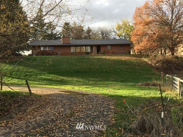245 Messner Road Dayton, WA 99328 - Photo 1 of 30 a front view of house with yard and green space