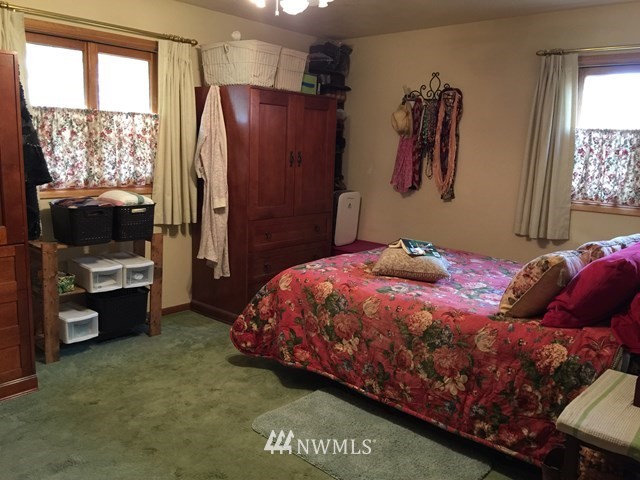 245 Messner Road Dayton, WA 99328 - Photo 13 of 30 a bedroom with a bed and a window