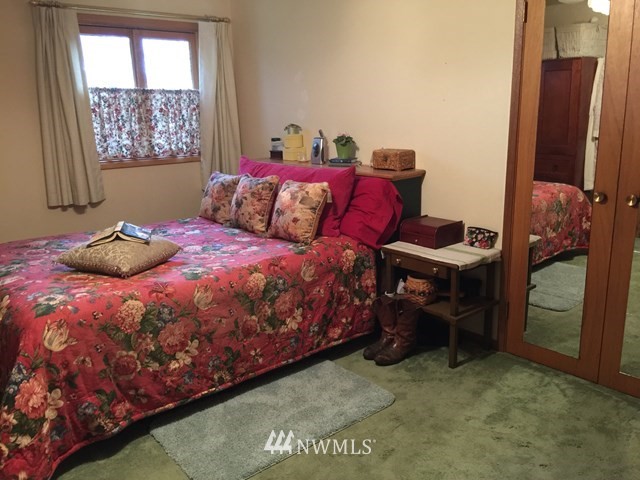 245 Messner Road Dayton, WA 99328 - Photo 14 of 30 a bedroom with a bed and a window