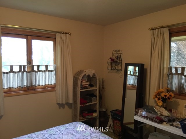 245 Messner Road Dayton, WA 99328 - Photo 16 of 30 a bedroom with furniture and a window