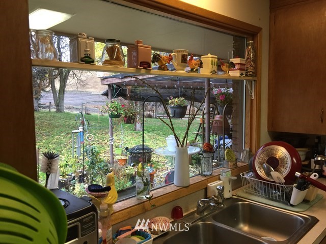 245 Messner Road Dayton, WA 99328 - Photo 7 of 30 a room with lots of wooden table and chairs