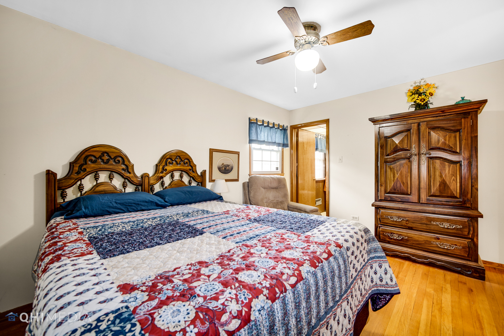 74 Arrowhead Drive Thornton, IL 60476 - Photo 10 of 26 a bedroom with a bed and dresser with wooden floor
