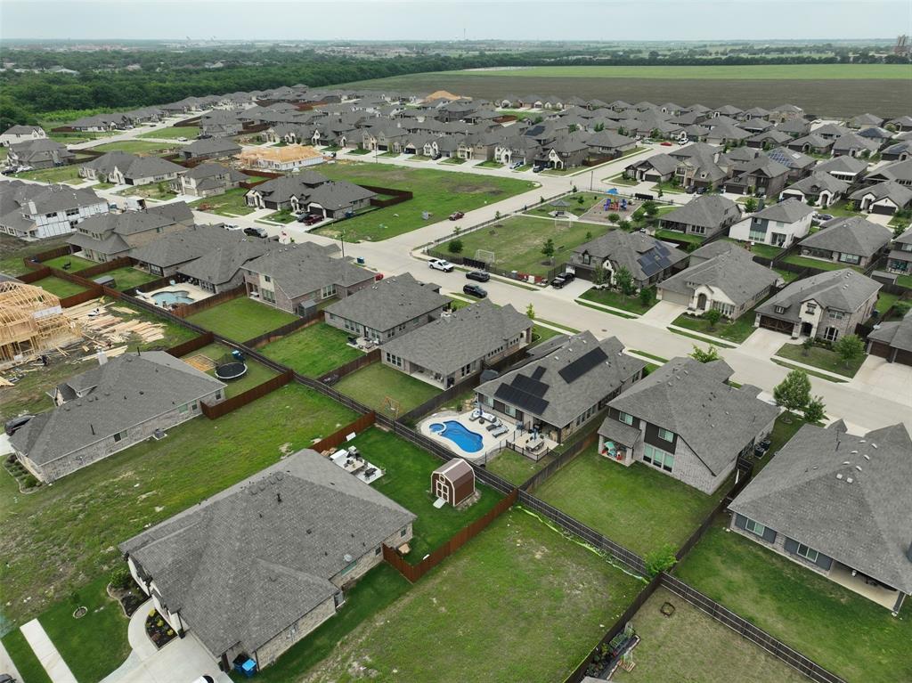 1084 Imperial Eagle Road Alvarado, TX 76009 - Photo 36 of 39 an aerial view of a house with a lake view
