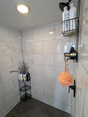 a bathroom with a sink and a shower