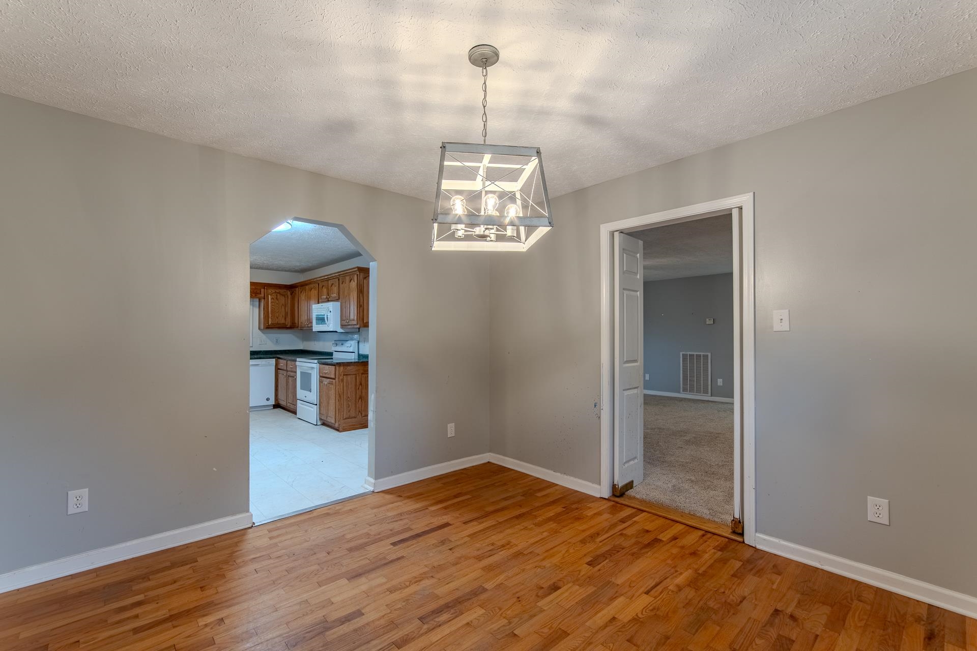 4985 Saltillo Road Saltillo, TN 38370 - Photo 13 of 40 a view of empty room with wooden floor