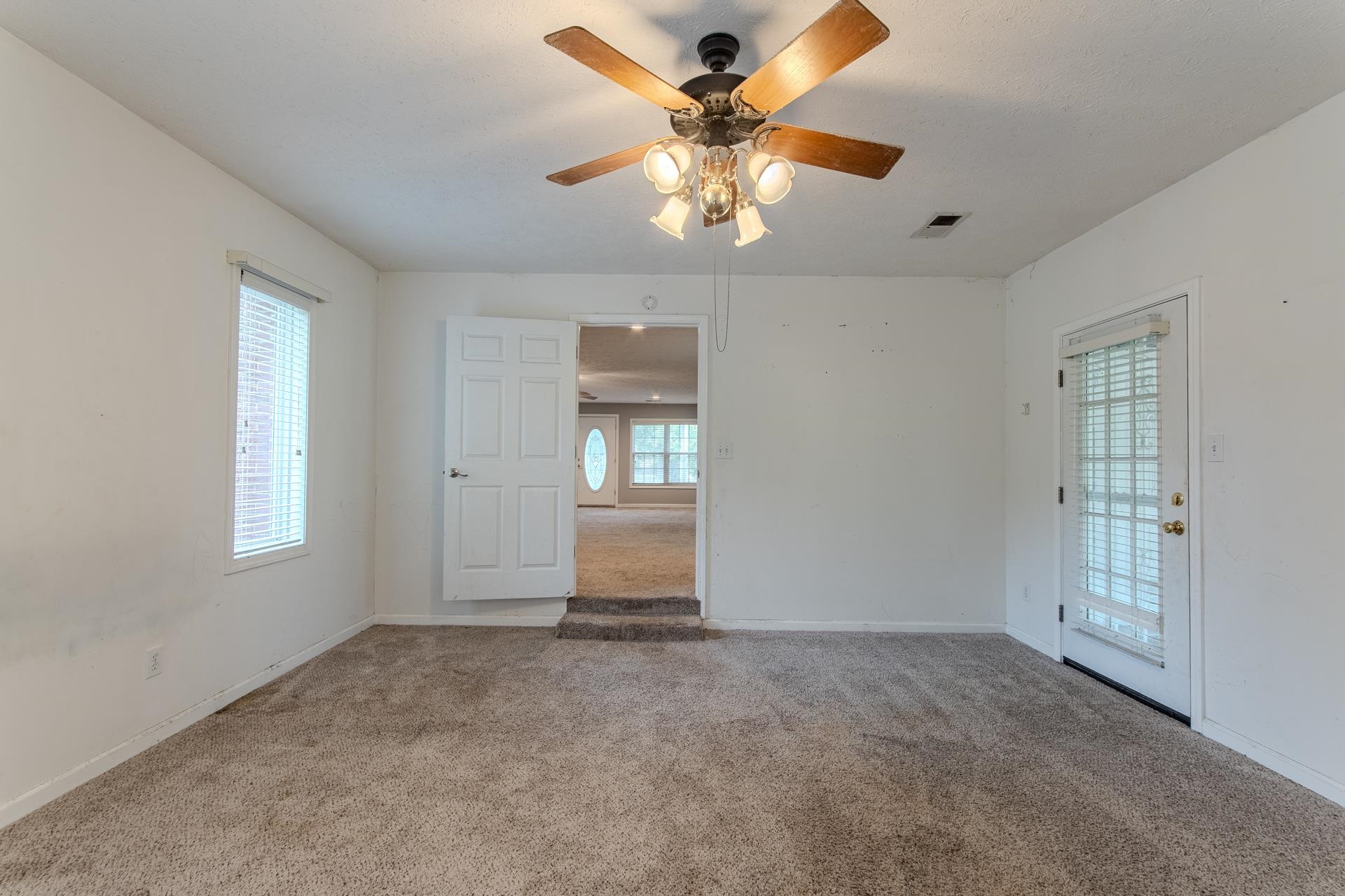 4985 Saltillo Road Saltillo, TN 38370 - Photo 17 of 40 a view of an empty room with a window