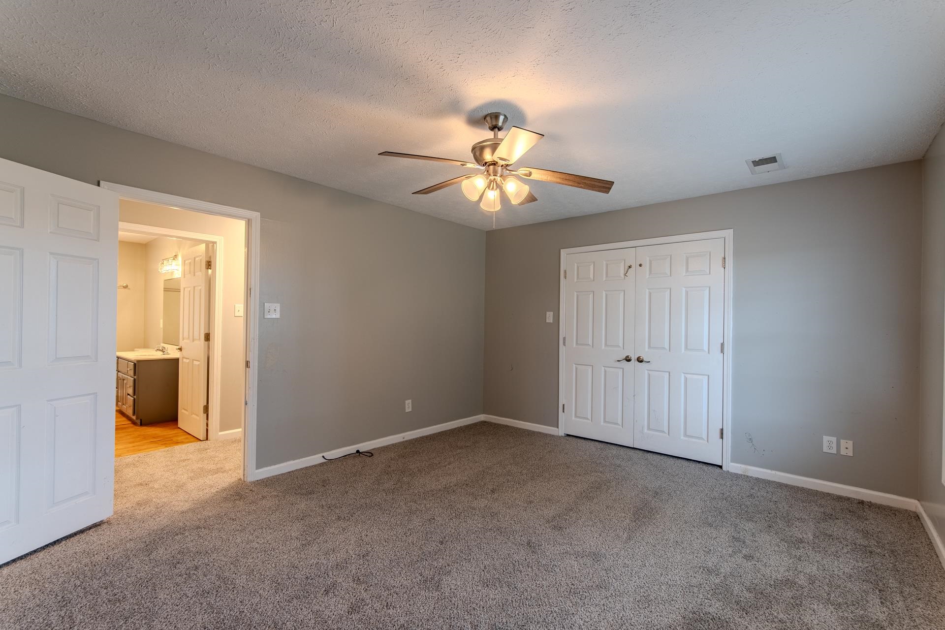 4985 Saltillo Road Saltillo, TN 38370 - Photo 23 of 40 a view of a room with a ceiling fan and a window
