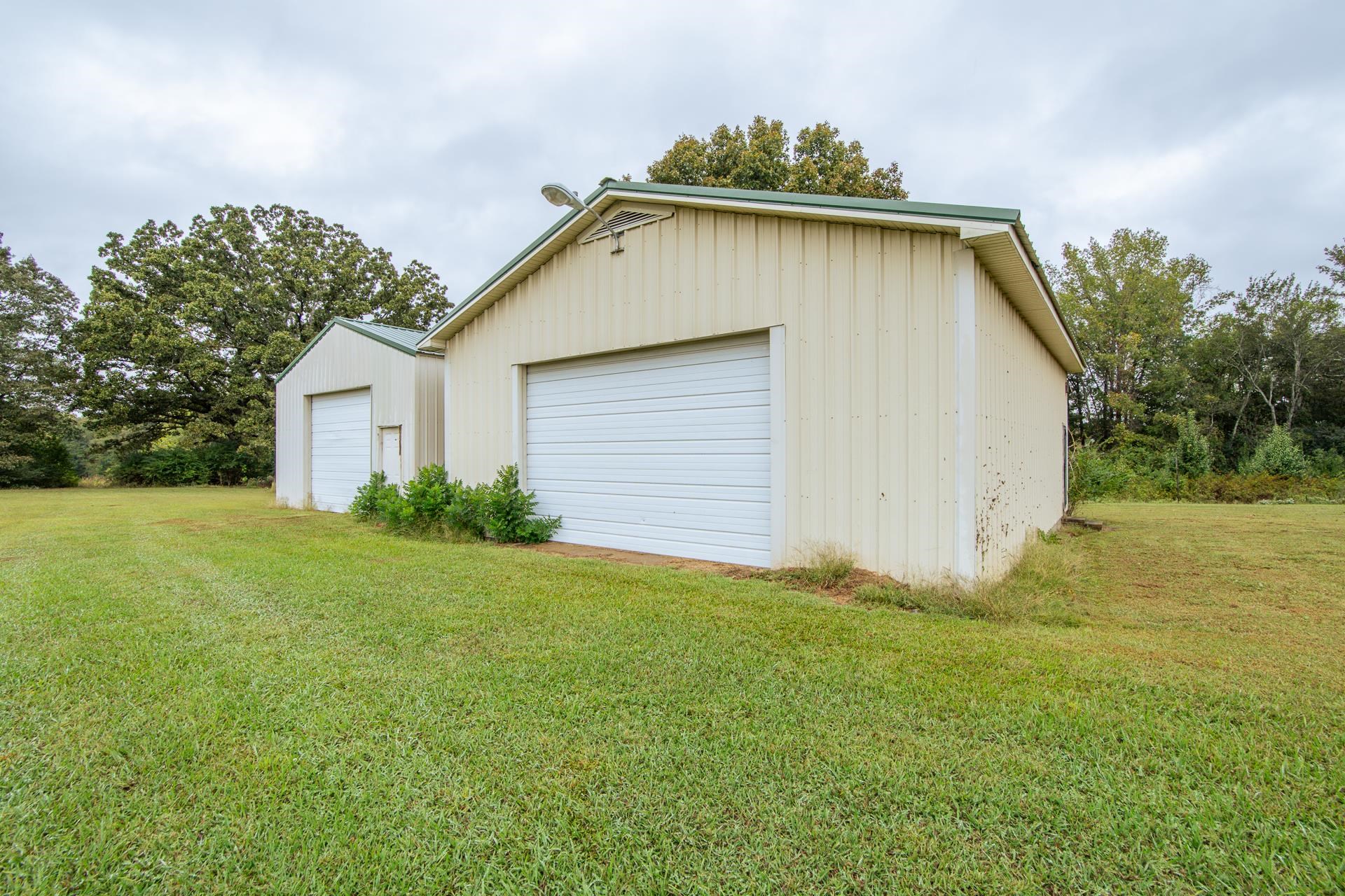 4985 Saltillo Road Saltillo, TN 38370 - Photo 32 of 40 a view of a backyard with a garden