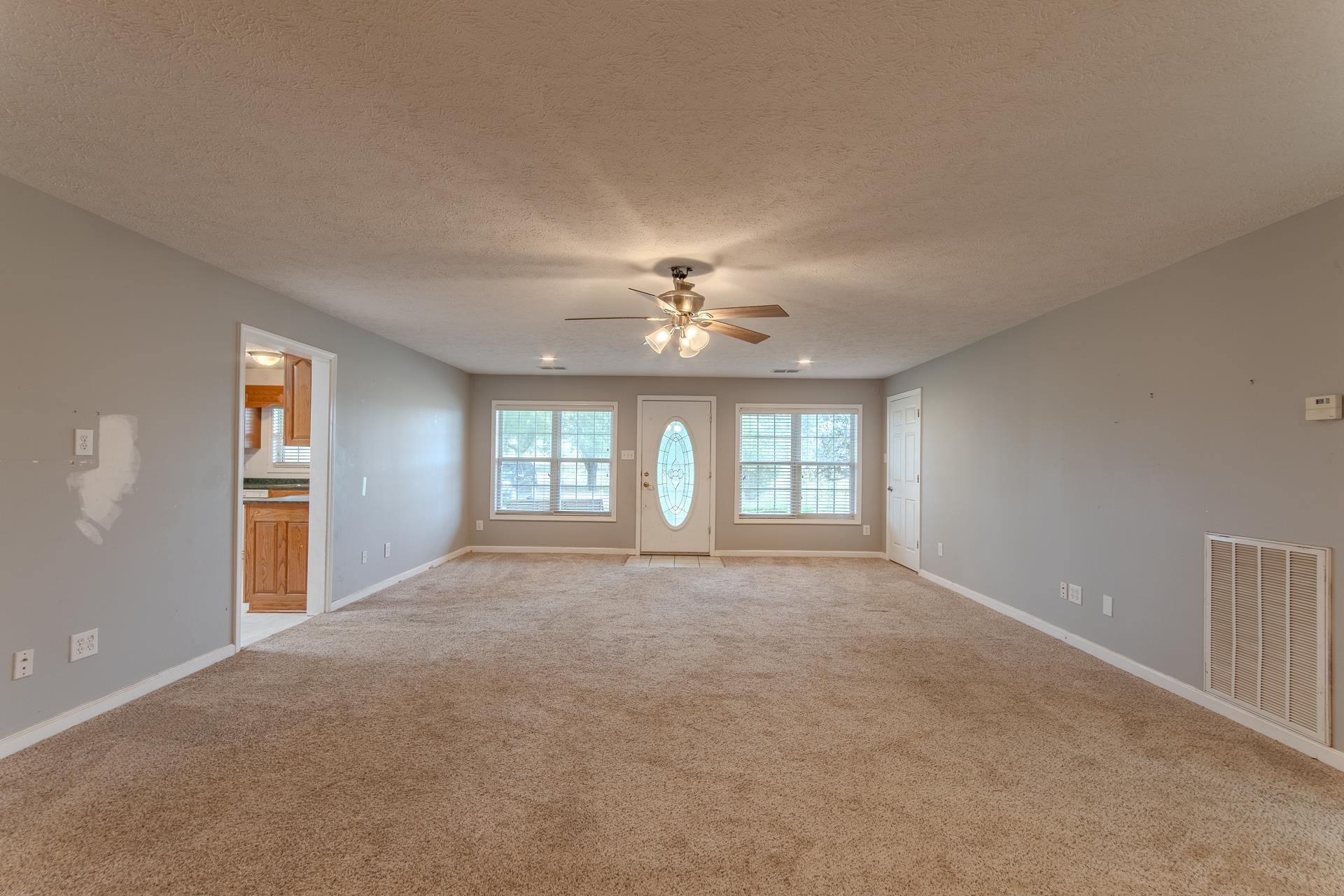 4985 Saltillo Road Saltillo, TN 38370 - Photo 5 of 40 a view of an empty room with a window