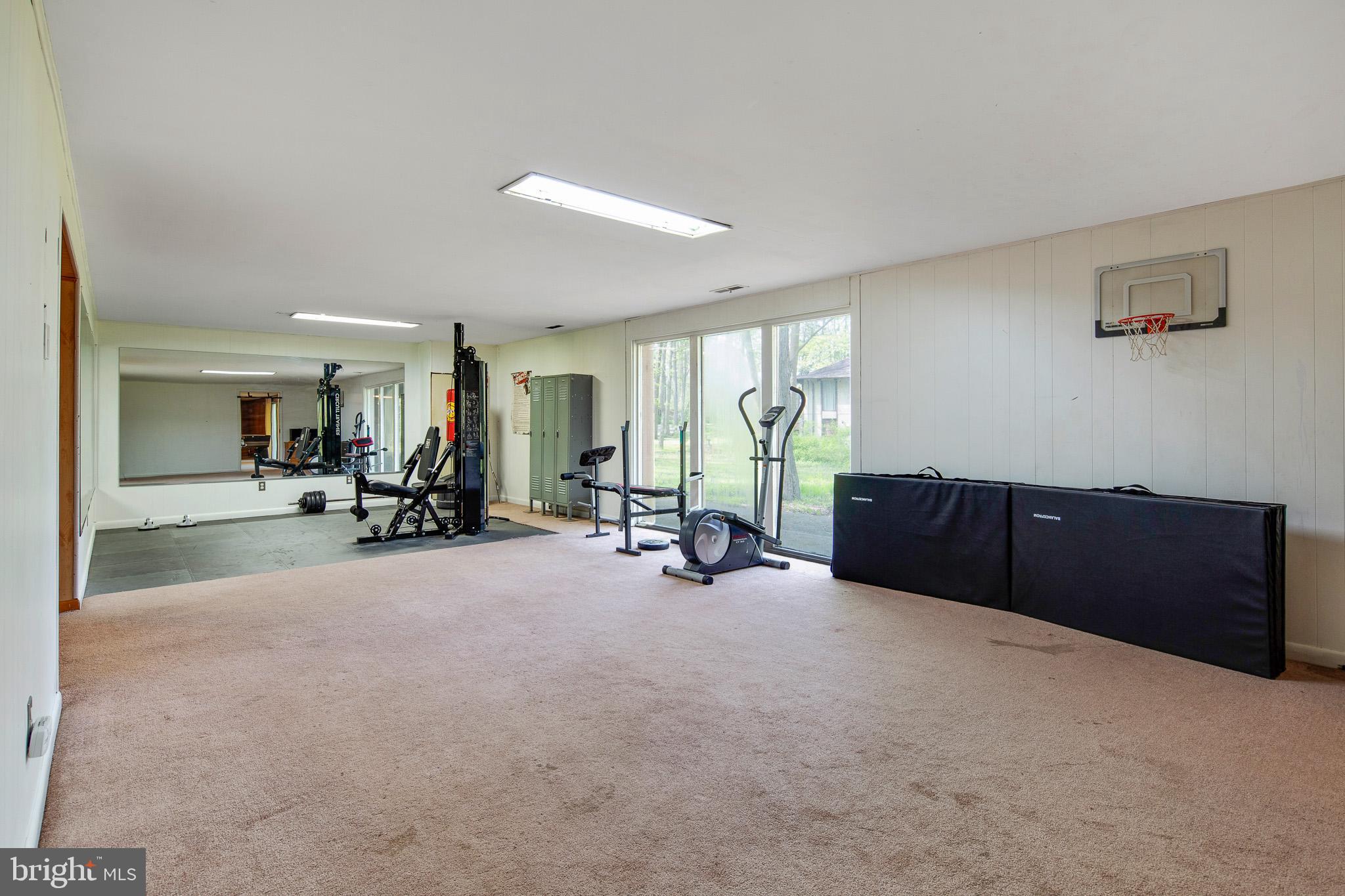 15 Springhill Road Mantua, NJ 08051 - Photo 20 of 34 Fully finished basement w/ personal gym