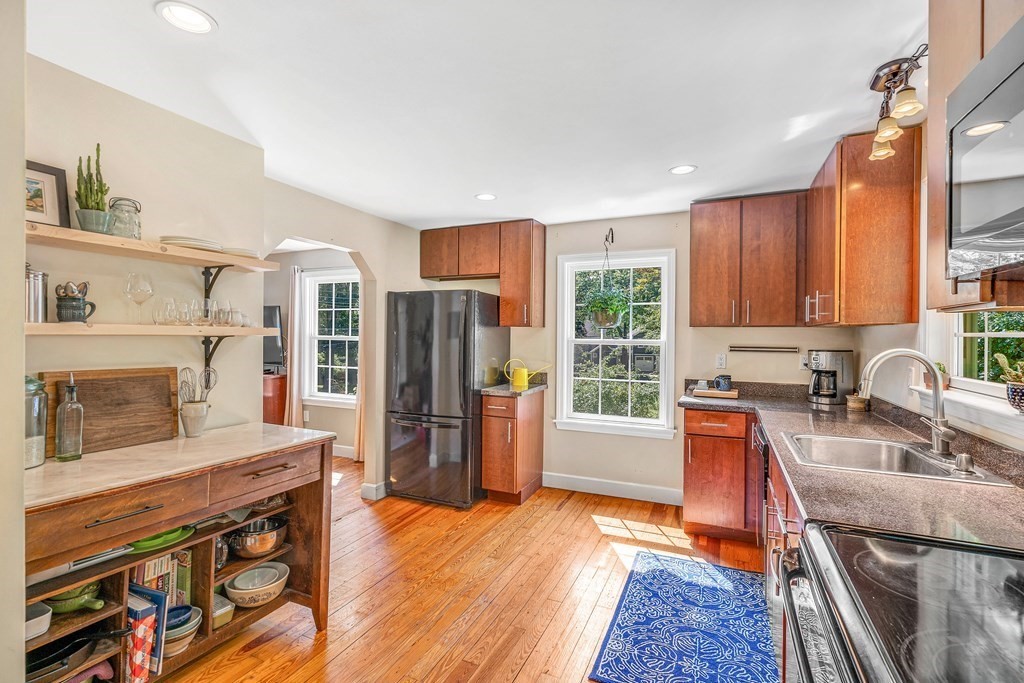 239 Sudbury Road Stow, MA 01775 - Photo 12 of 31 a kitchen with stainless steel appliances granite countertop a refrigerator stove top oven and sink