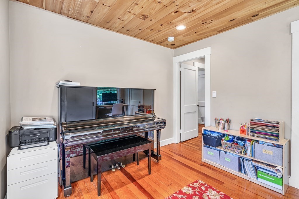 239 Sudbury Road Stow, MA 01775 - Photo 17 of 31 a reading room with furniture and a piano