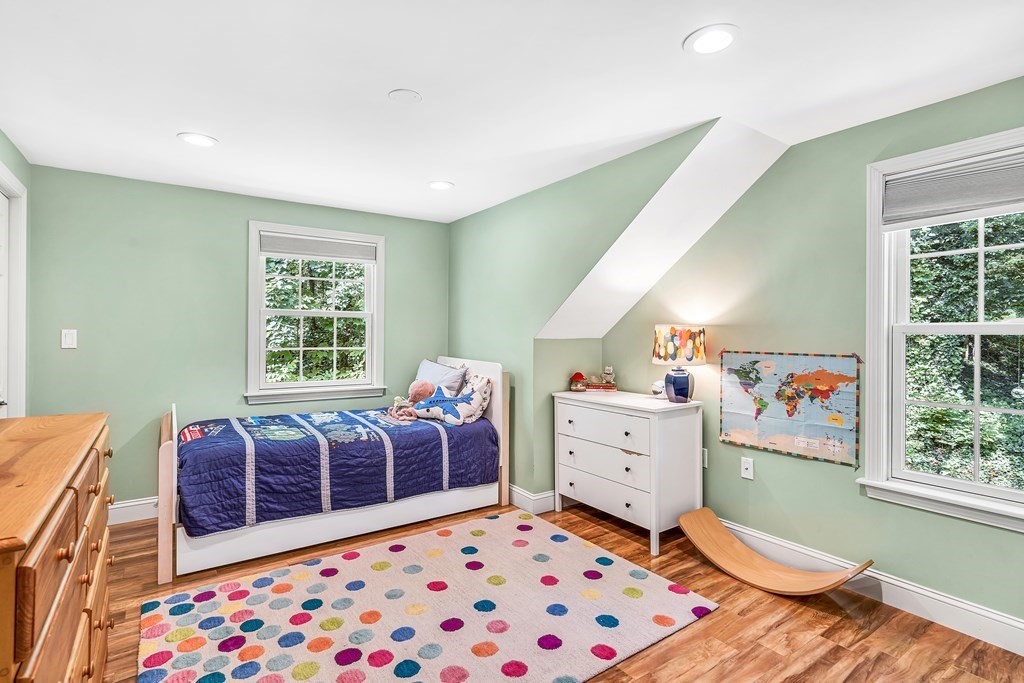 239 Sudbury Road Stow, MA 01775 - Photo 20 of 31 a bedroom with furniture and a window
